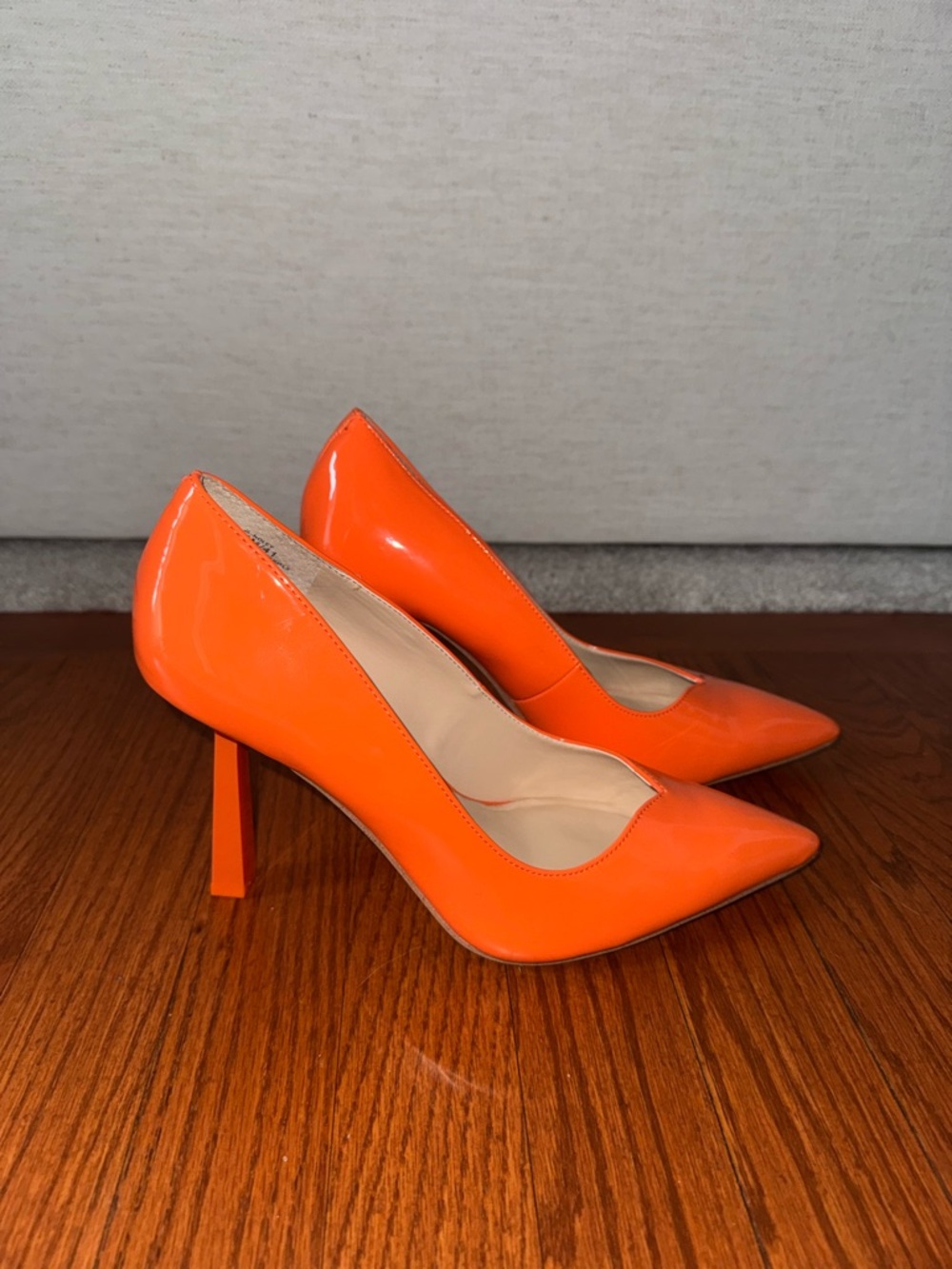 JLO Orange Pumps